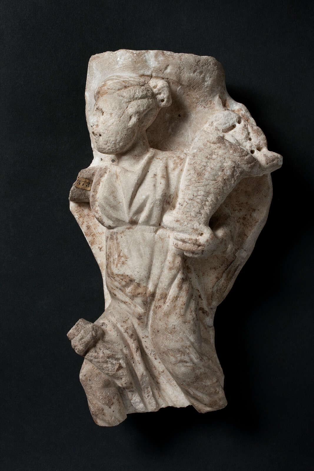 Fragment de statuette en marbre ramené de Rome (époque gallo-romaine)